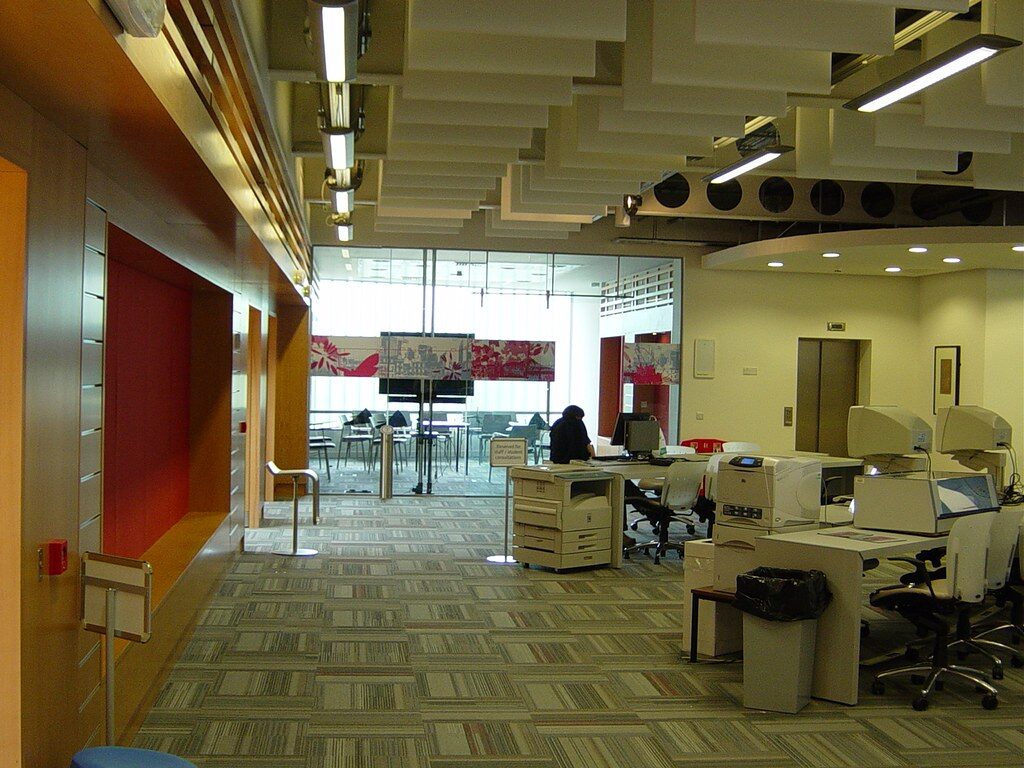 Modern technology workspace with computers and screens